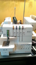Плоскошовная швейная машинка Merrylock 095